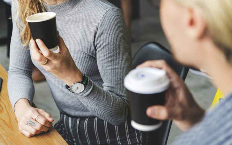 friends-enjoying-hot-coffee-together